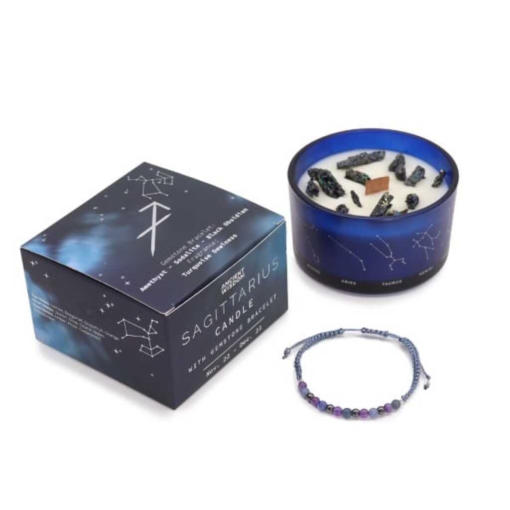 a zodiac candle with crystals and a gemstone bracelet - sagittarius