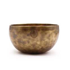 A large brass Nepalese Moon Singing Bowl