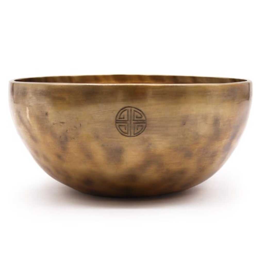 An extra-large brass Nepalese Moon Singing Bowl.