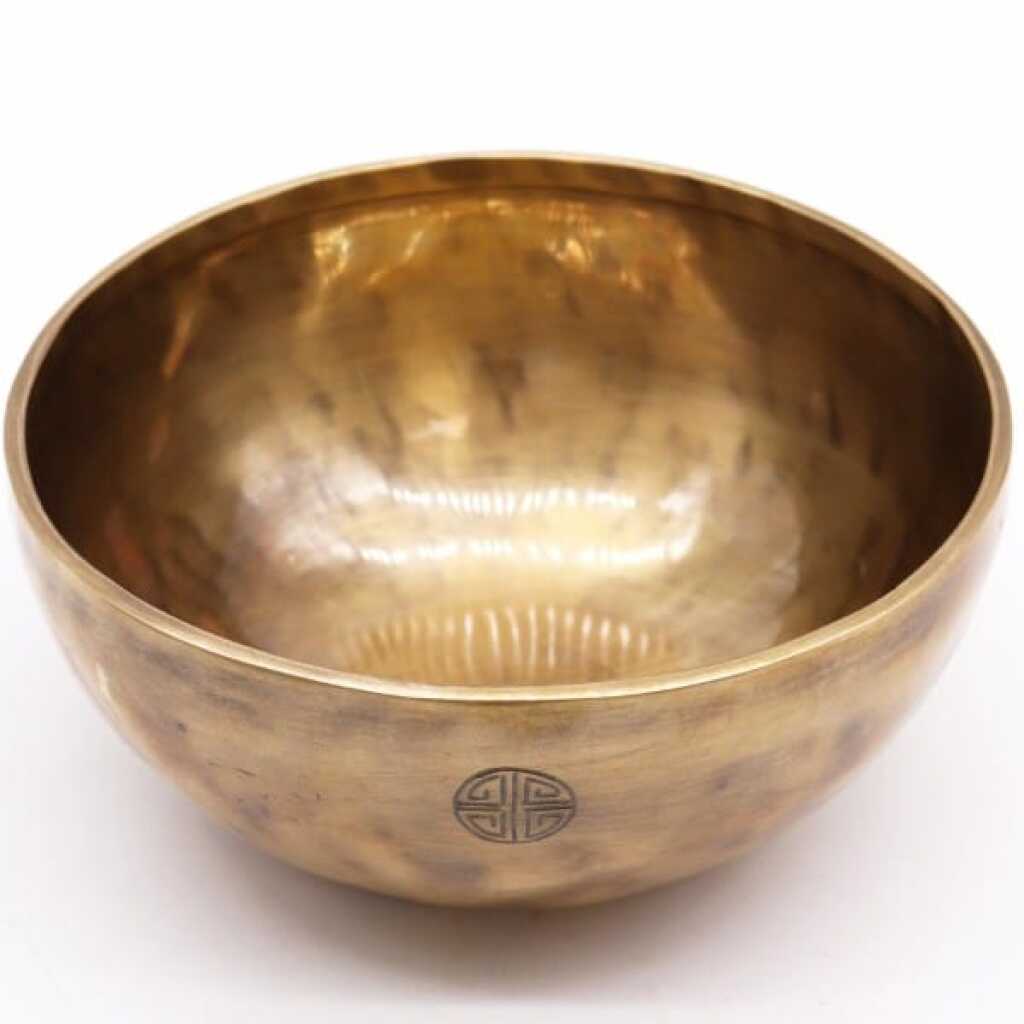 An extra-large brass Nepalese Moon Singing Bowl.