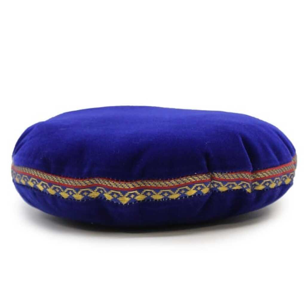 A 16cm, blue velvet singing bowl cushion.