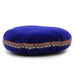 A 16cm, blue velvet singing bowl cushion.