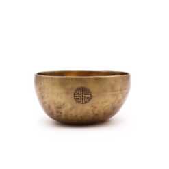 A small brass Nepalese Moon Singing Bowl