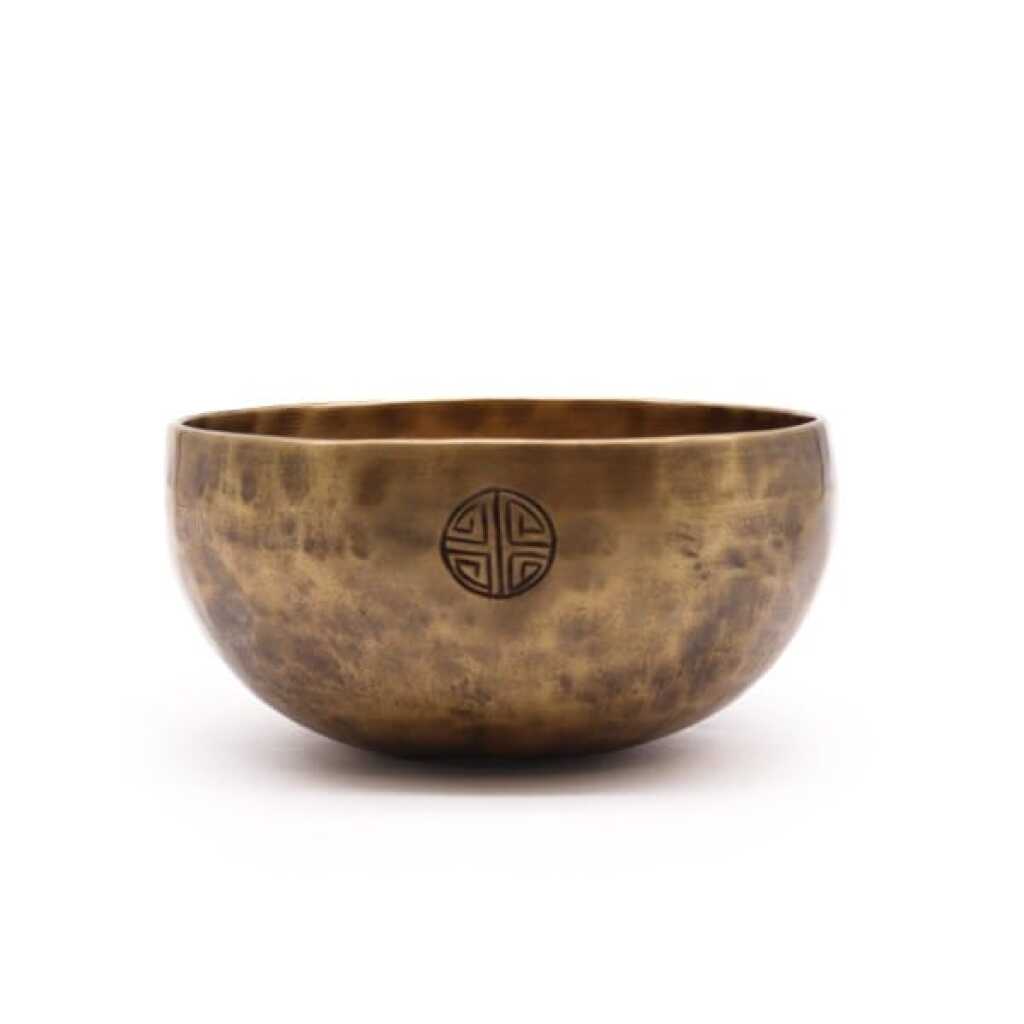 A medium brass Nepalese Moon Singing Bowl