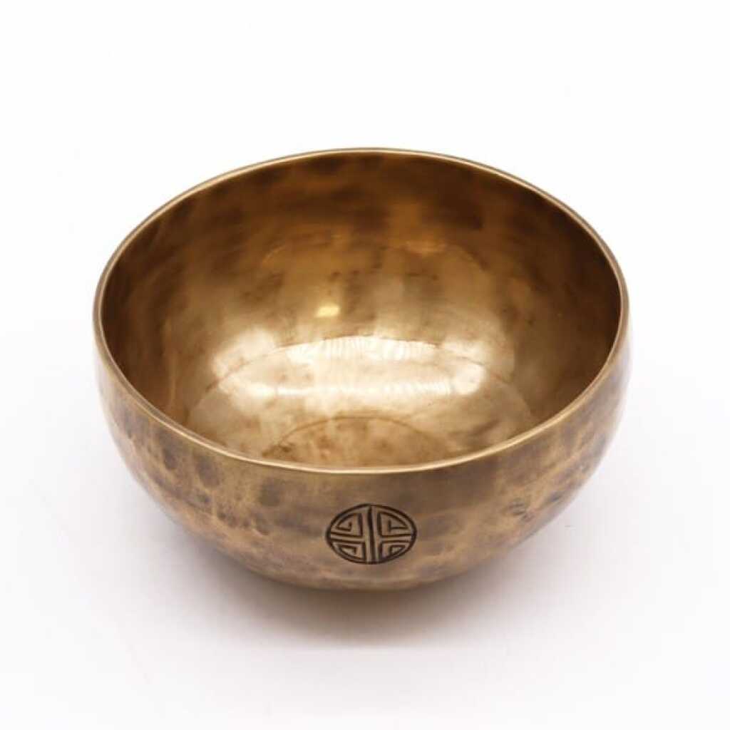 A medium brass Nepalese Moon Singing Bowl