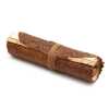 A rolled leather travel notebook, rolled up