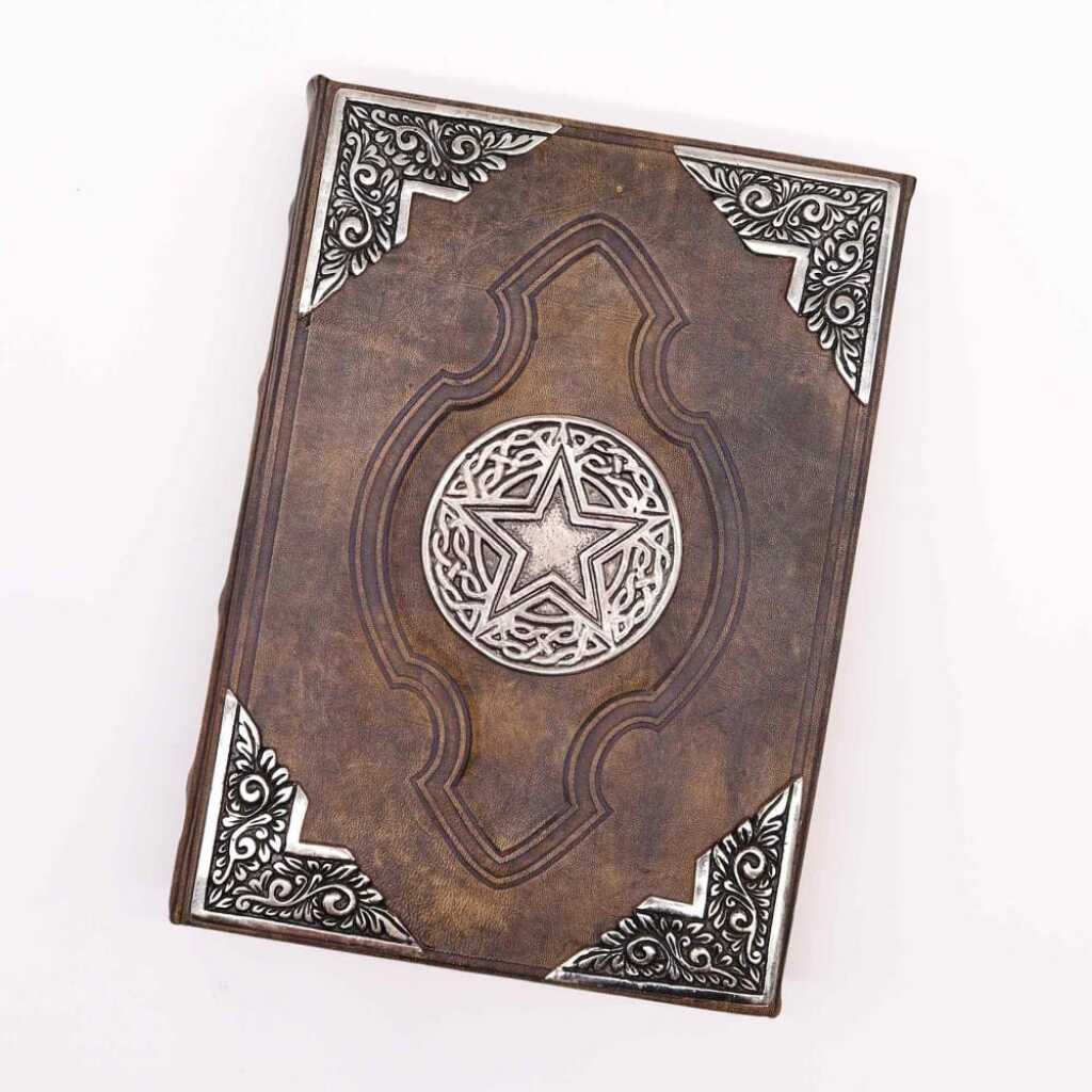 A stunning Hefty Brown Tan Book with Pentangle Design