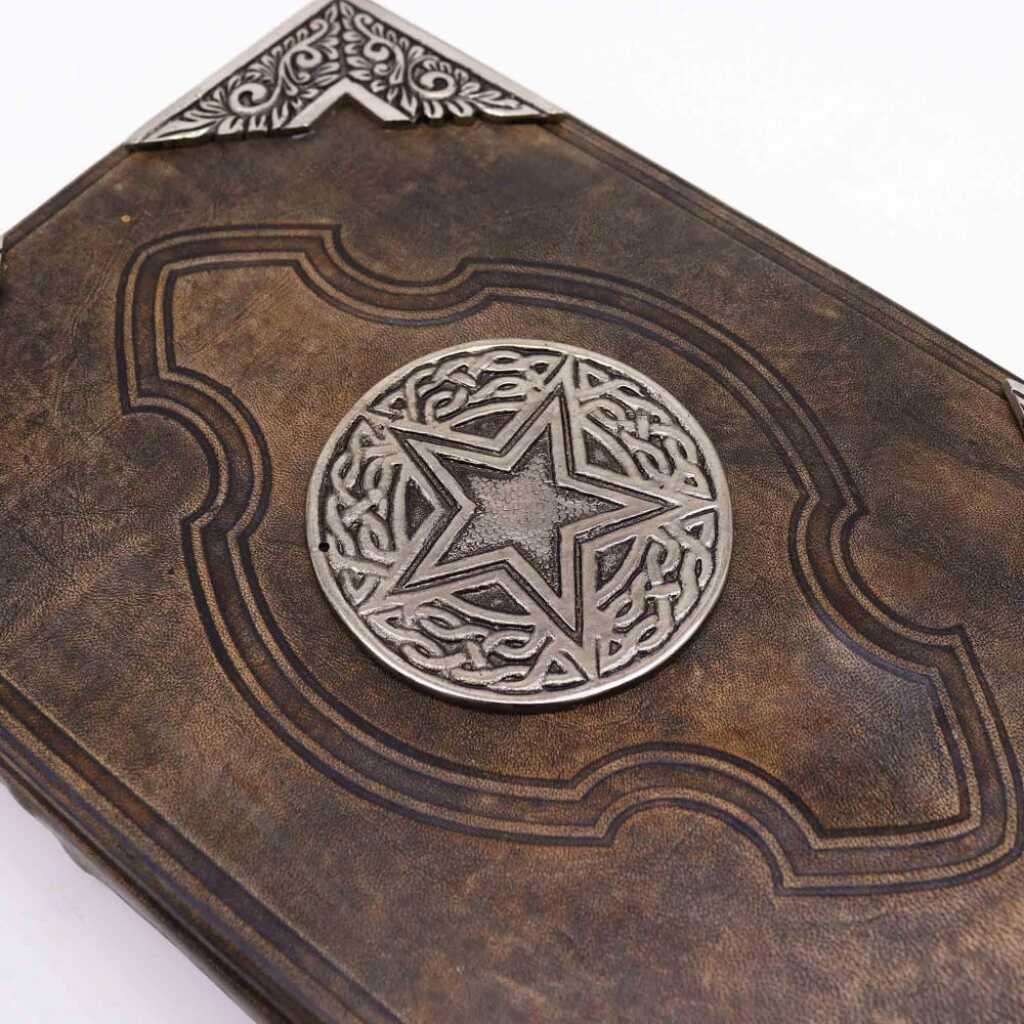 A stunning Hefty Brown Tan Book with Pentangle Design