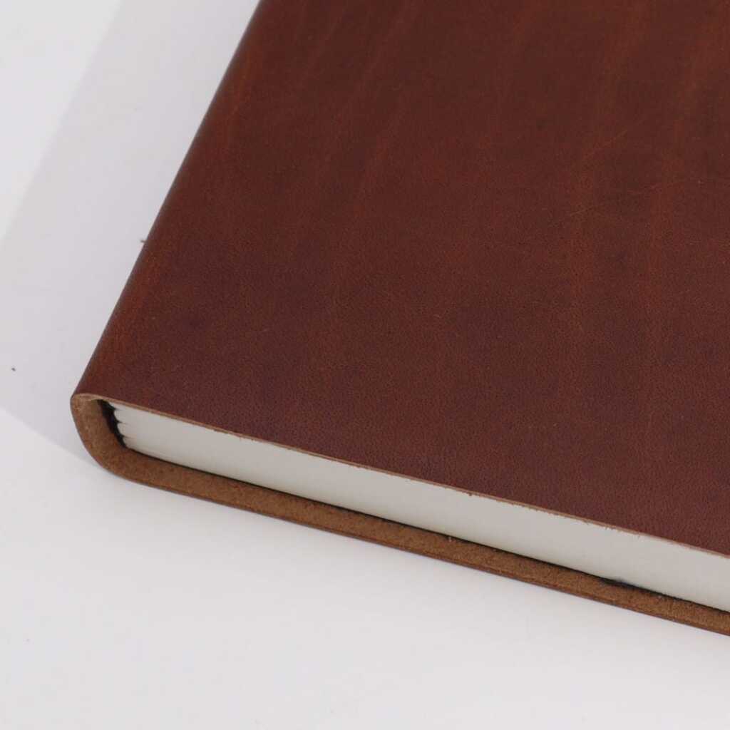 A Dark Tan leatherbound notebook with 100 lined pages