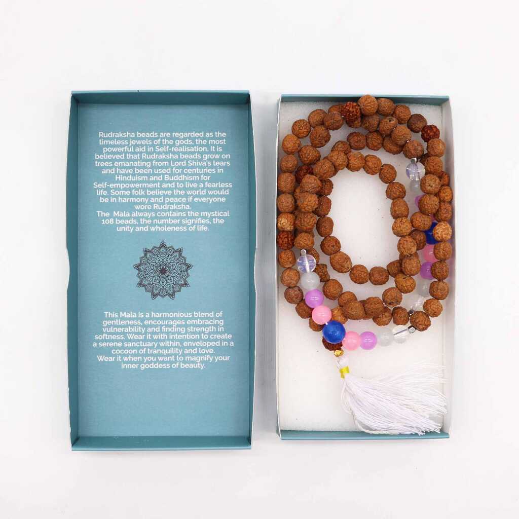 a Bali Mala Necklace with 108 Rudraksha beads and a tassel, in its box