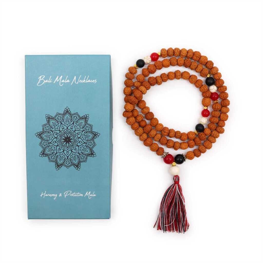 a Bali Mala Necklace with 108 Rudraksha beads and a tassel, with packaging