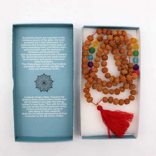 a Bali Mala Necklace with 108 Rudraksha beads and a tassel, in its box