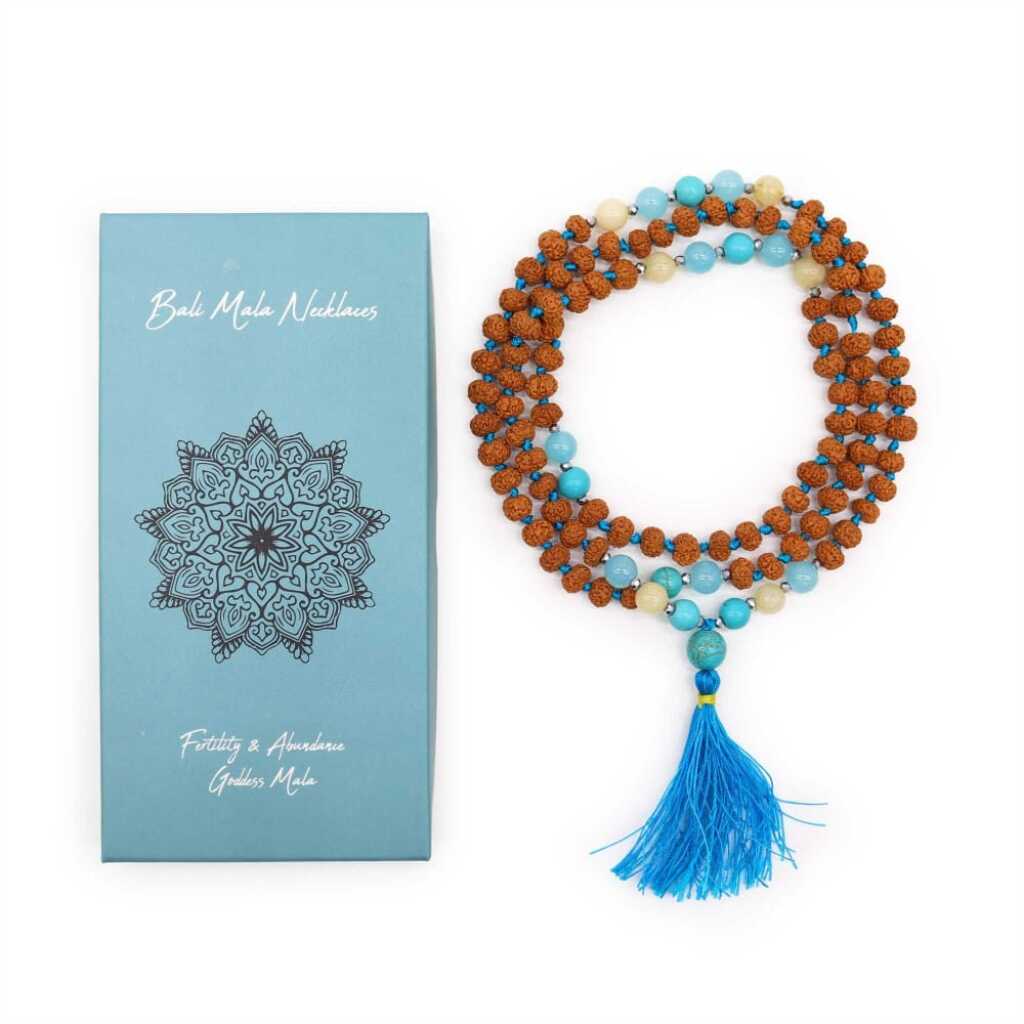 a Bali Mala Necklace with 108 Rudraksha beads and a tassel, with packaging