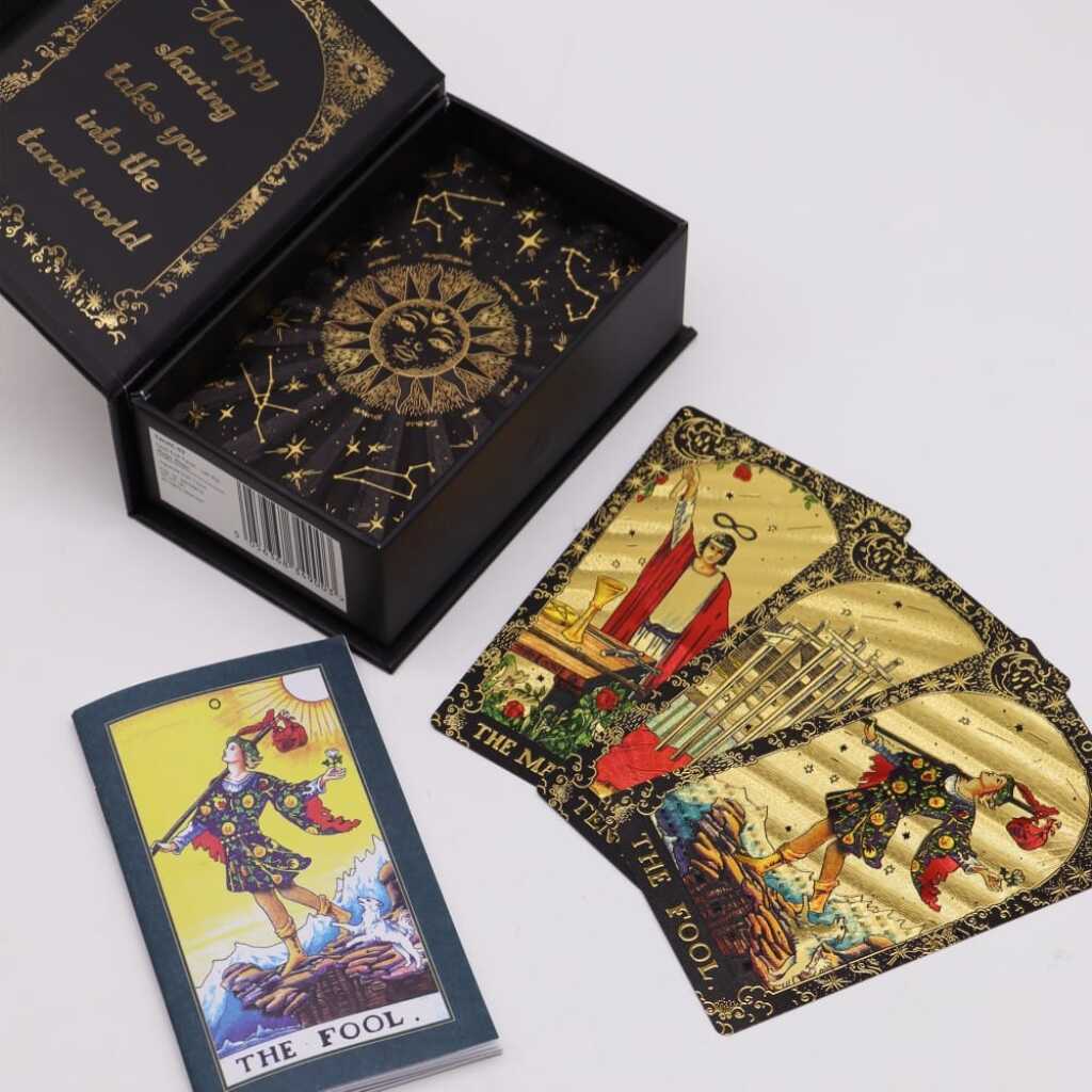 A pack of Gold Foil "Let the Magic Begin" Tarot Cards showing contents