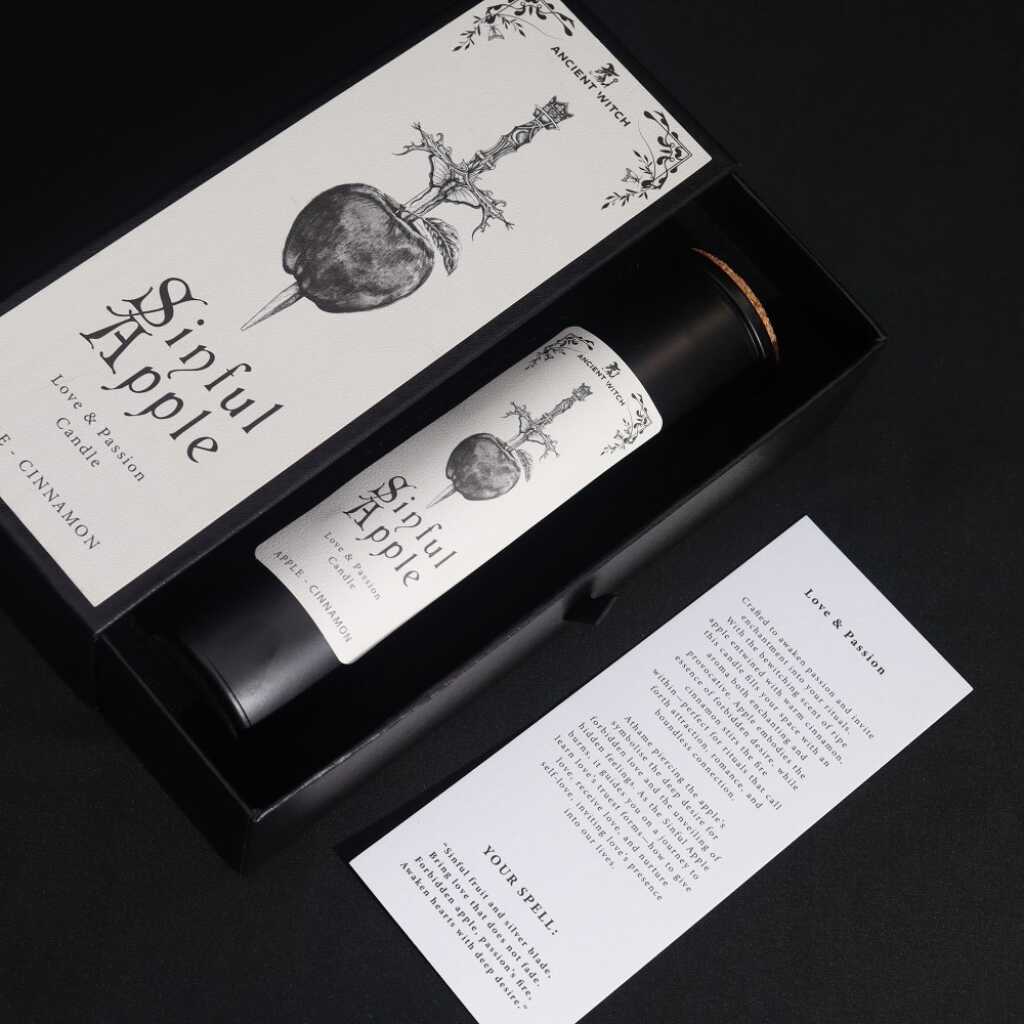 an ancient witch ritual candle with packaging on a dark background