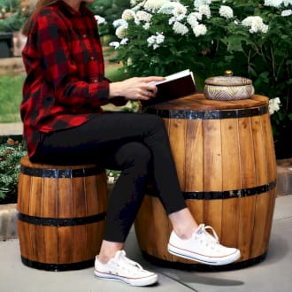 a barrel table and a matching stool