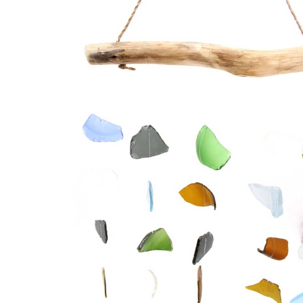 Driftwood and reclaimed glass wind chimes with five strings of beads.