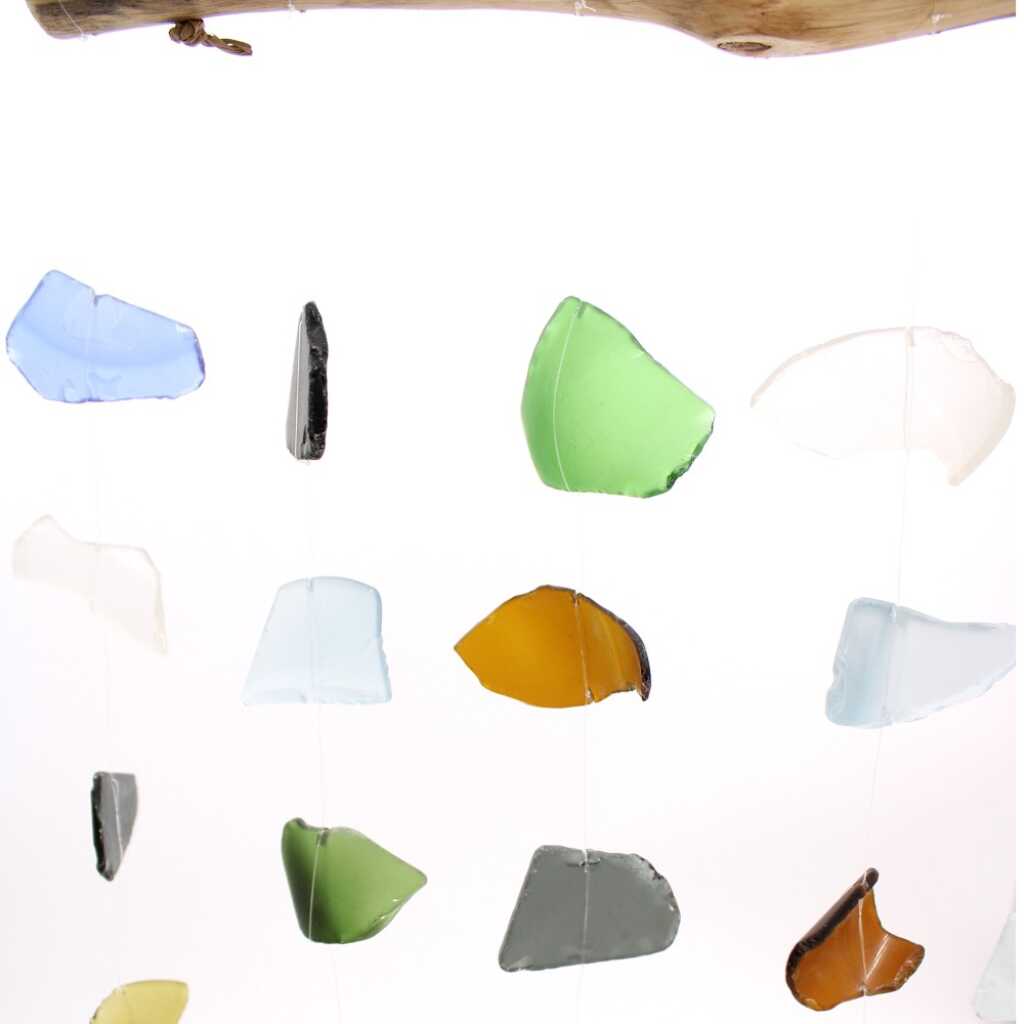 Driftwood and reclaimed glass wind chimes with five strings of beads.
