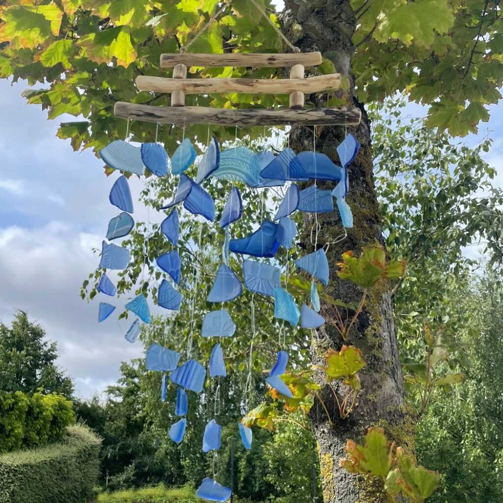 Driftwood and reclaimed glass wind chimes with three driftwood sticks and blue glass