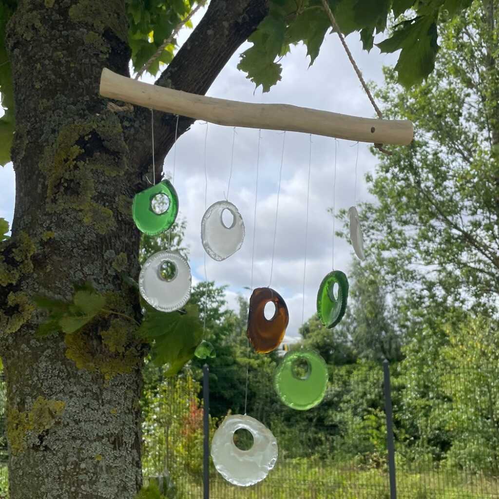 Driftwood and reclaimed glass wind chimes with one driftwood stick and assorted glass
