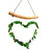 Driftwood and reclaimed glass wind chimes with one driftwood stick and a love heart made from green glass