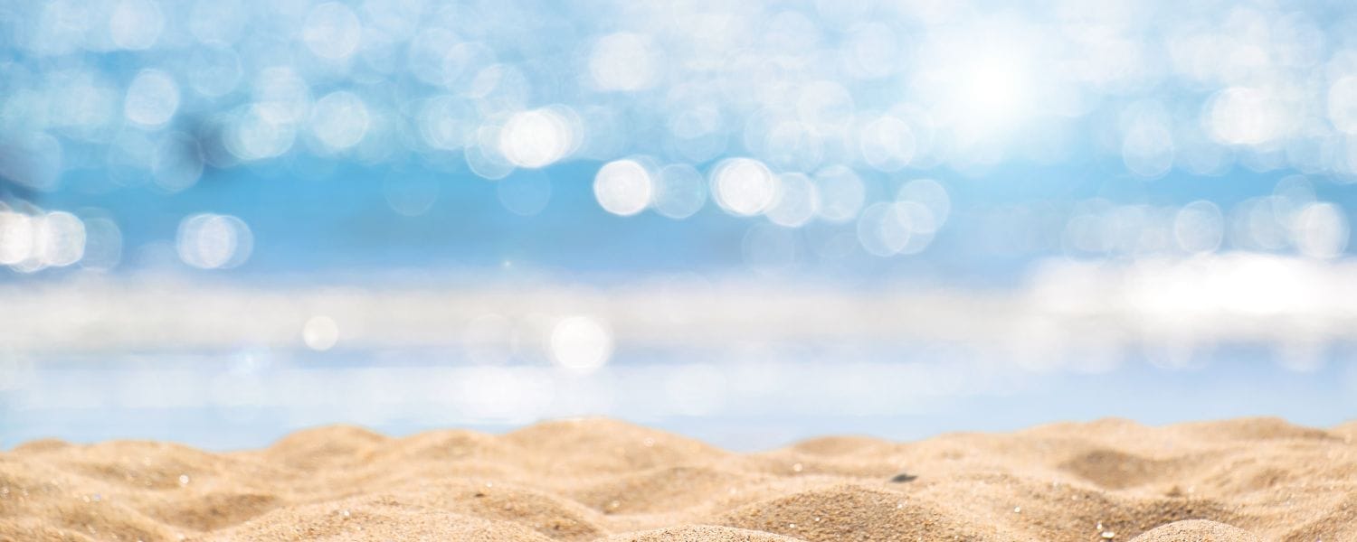 summer sand meeting the sea