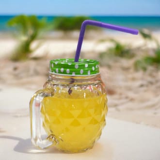 a funky mason jar with straw