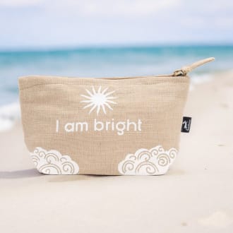 hop hare jute pouch on a beach