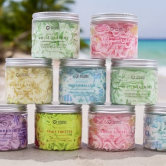 Whipped soaps on a beach background