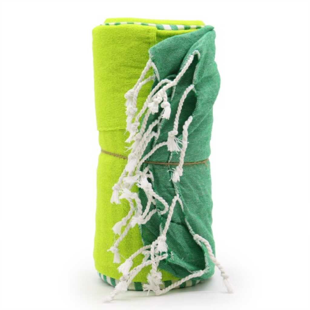 a rolled up, picnic green cotton pareo towel