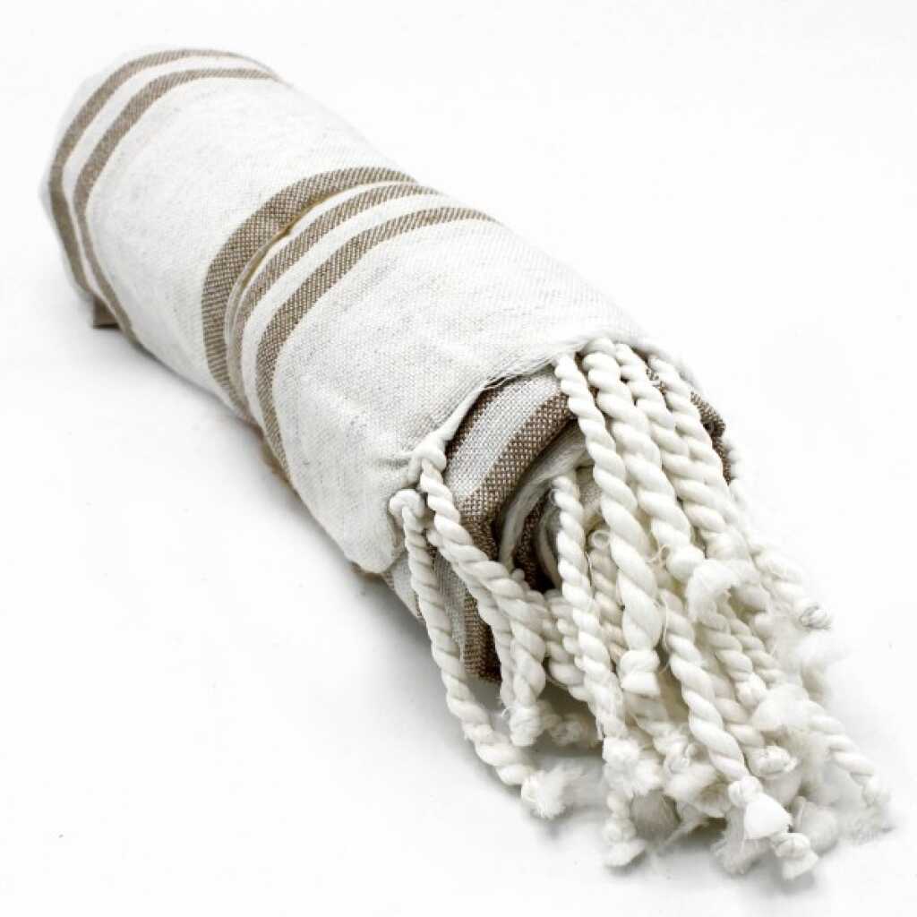 Hammam Spa towel in sand colour, rolled up