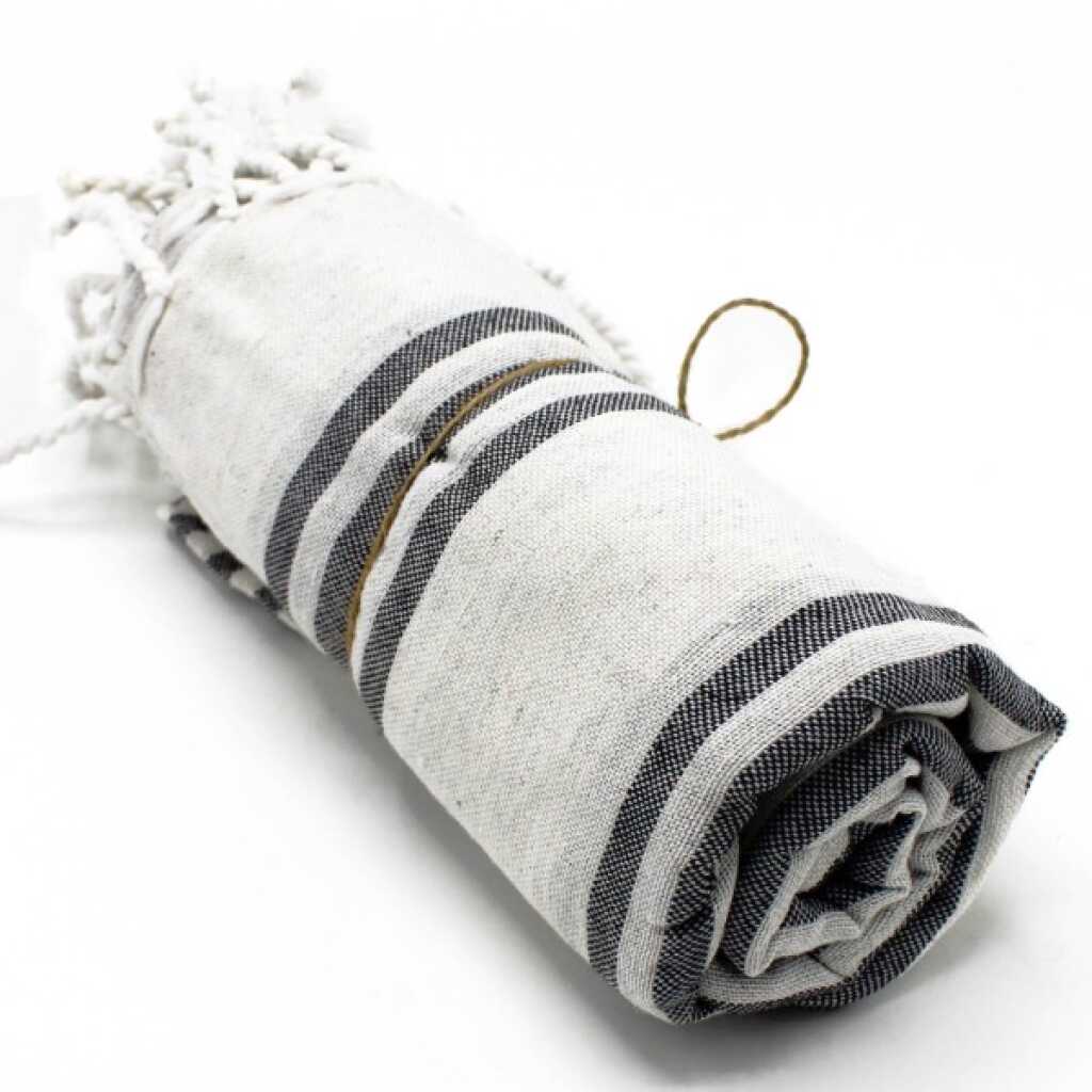 Hammam Spa towel in charcoal colour, rolled up