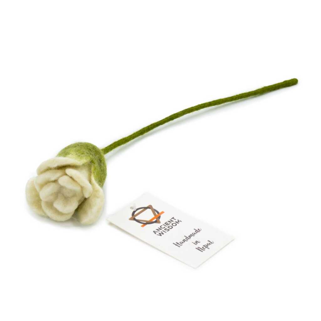 a solid white rose - made from felt