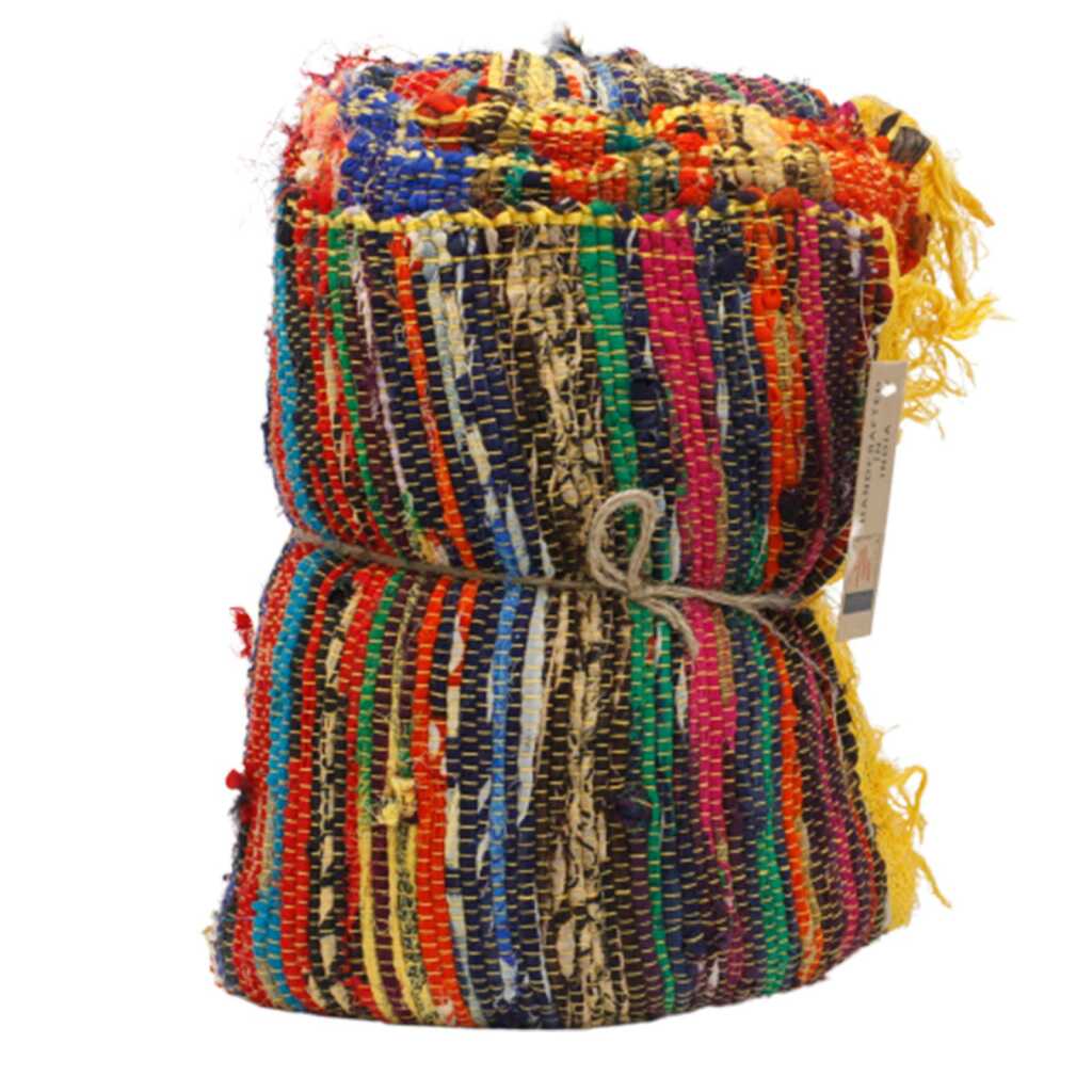 A rolled up Indian Rag Rug - yellow