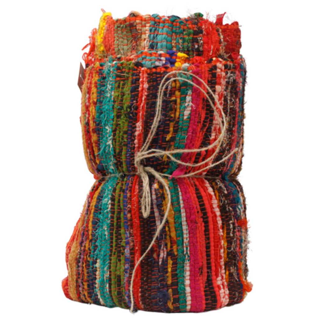 A rolled up Indian Rag Rug - orange